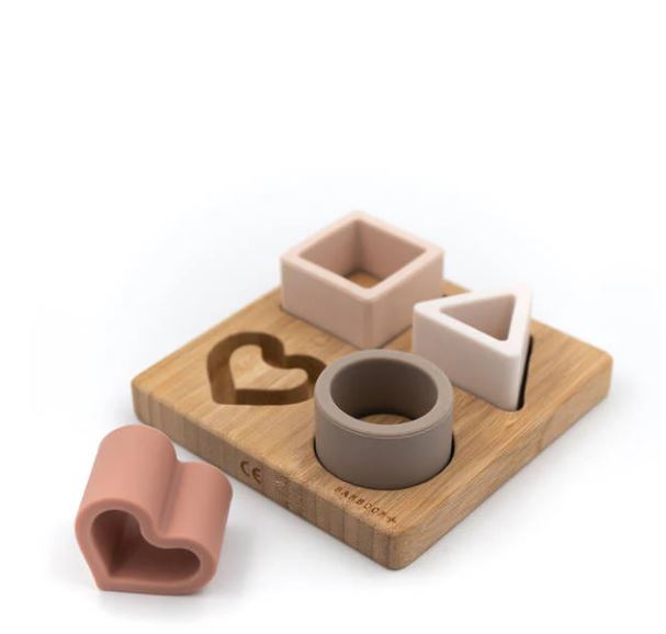 BAMBOOM Puzzle bimbo Cuore formine in morbido silicone con base in legno di bamboo Rosa